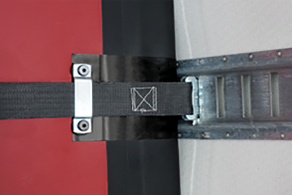 Strap securing van bulkhead